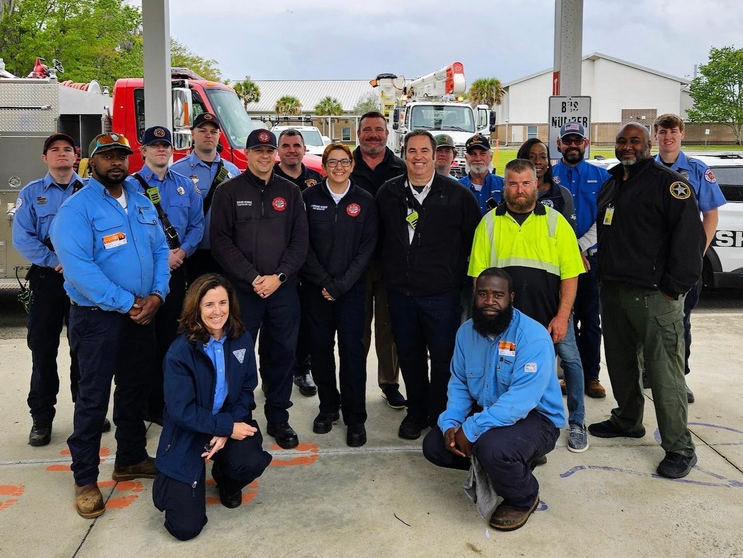 A group of firefighters standing for a picture